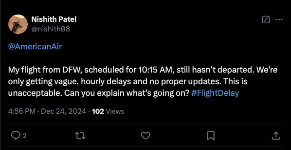 X post from user @nishith08 saying, "@AmericanAir my flight from DFW, scheduled for 10:15 AM, still hasn't departed. We're only getting vague, hourly delays and no proper updates. This is unacceptable. Can you explain what's going on? #FlightDelay"